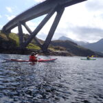 Paddling under Kylesku Bridge
